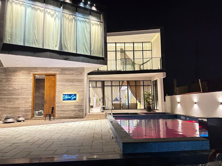 Vitamin Sea private residence pool deck at night